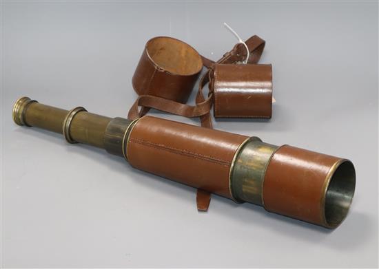 A large leather cased five-draw telescope extends to 110.5cm